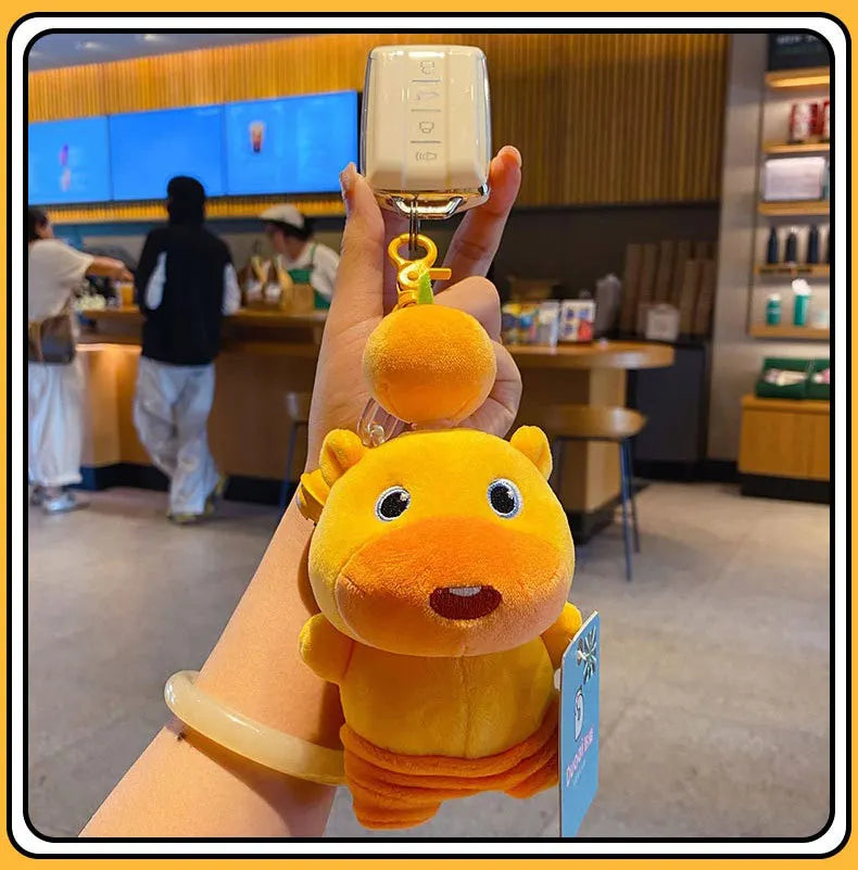 Genuine Capybara Lulu Doll Plush Pendant KeyChain Fun Pull Line Rotating Doll Student Schoolbag KeyChain Cute Cartoon Decoration
